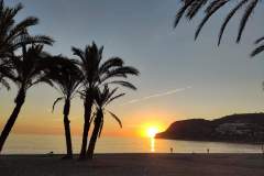 Watch the sunset from the beach